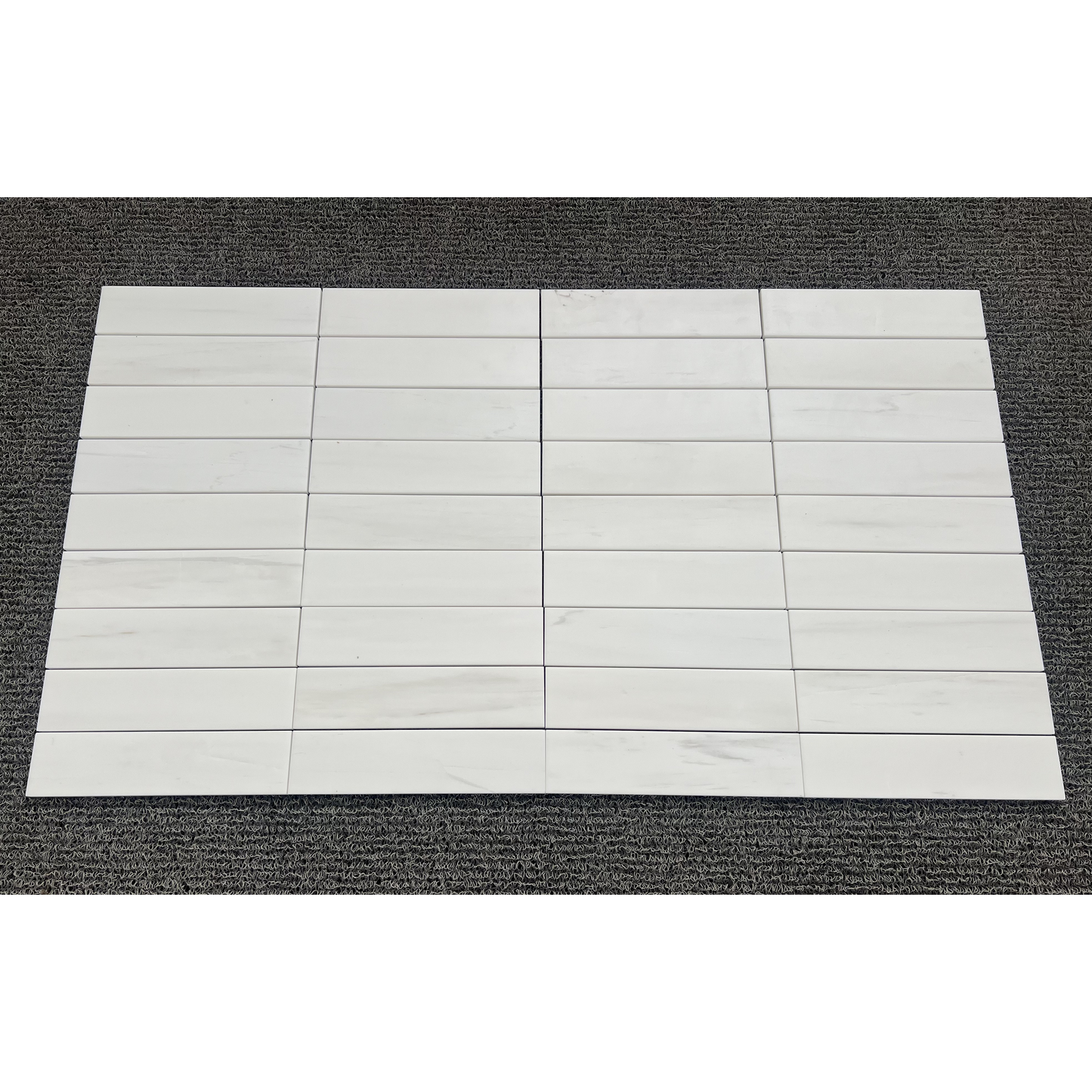 2.25" x 9" BIANCO DOLOMITE BRUSHED & PILLOWED EDGE