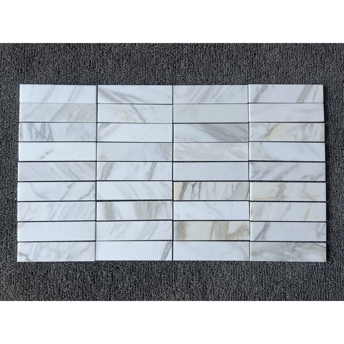 2.25" x 9" CALACATTA GOLD BRUSHED & PILLOWED EDGE