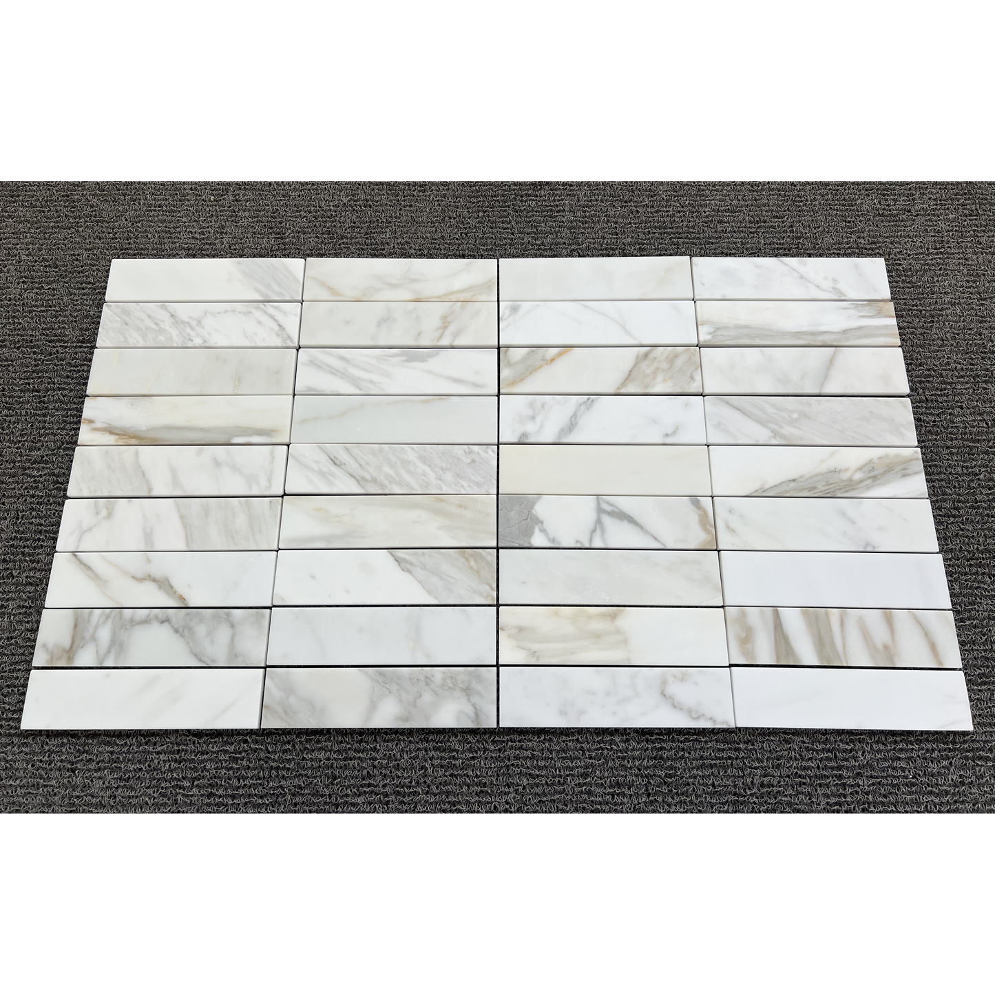 2.25" x 9" CALACATTA GOLD BRUSHED & PILLOWED EDGE
