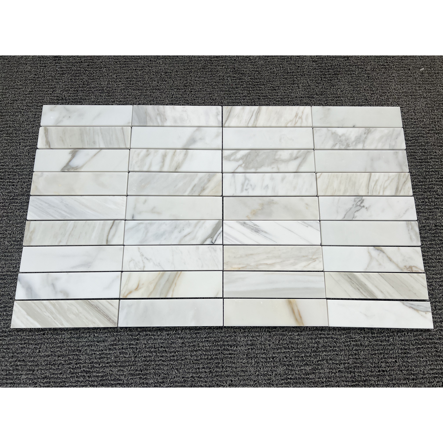2.25" x 9" CALACATTA GOLD BRUSHED & PILLOWED EDGE