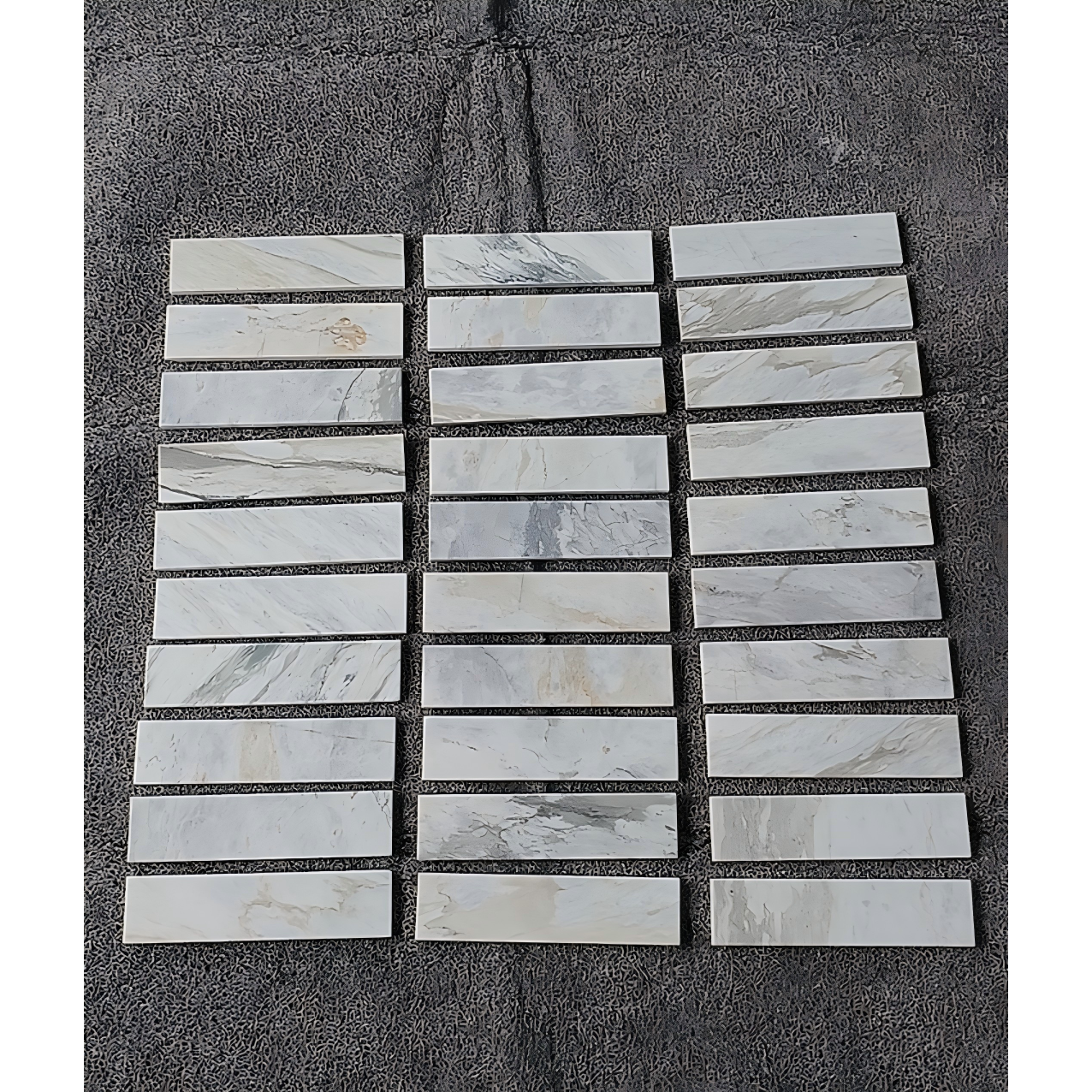2.25" x 9" CALACATTA MANHATTAN BRUSHED & PILLOWED EDGE