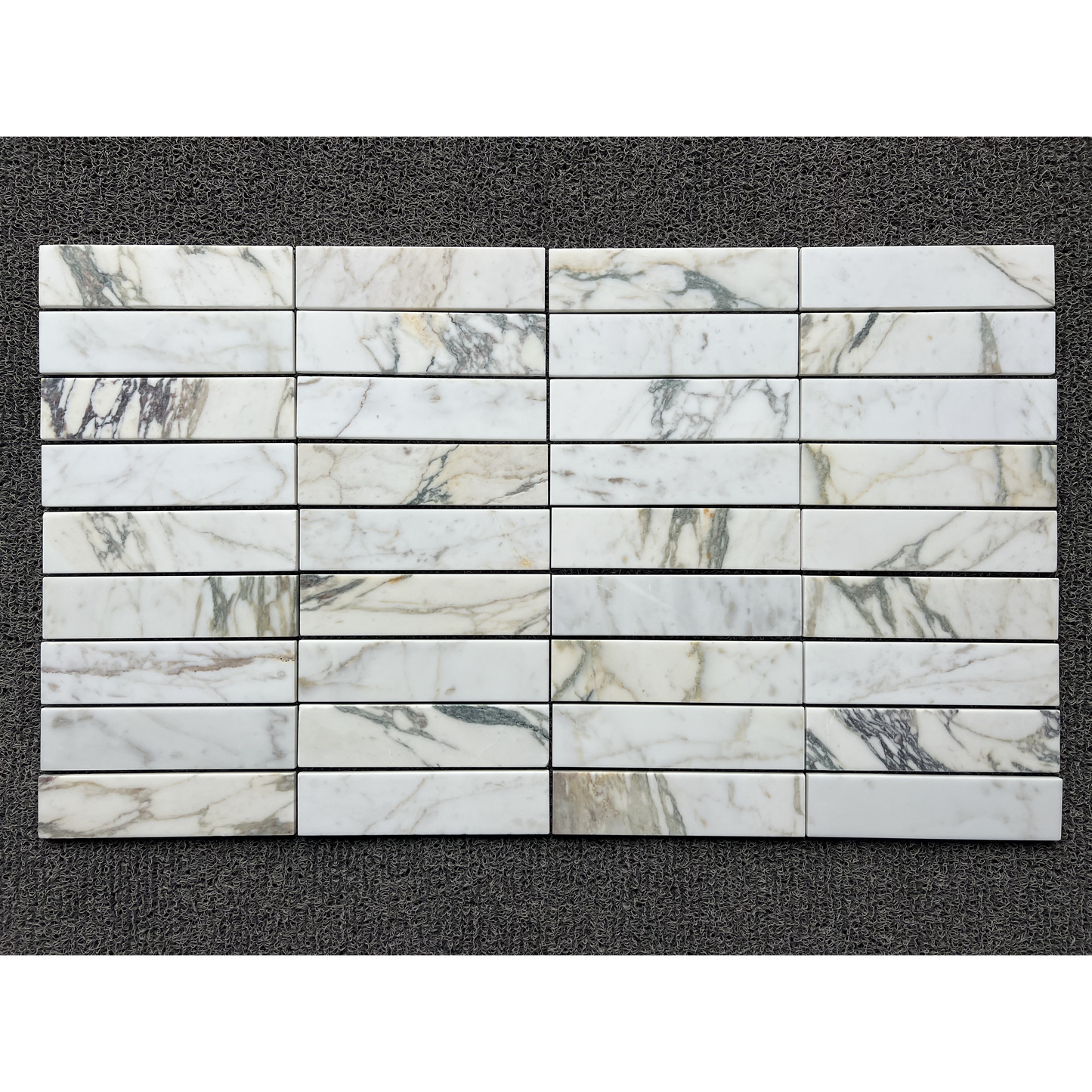 2.25" x 9" CALACATTA MONET BRUSHED & PILLOWED EDGE