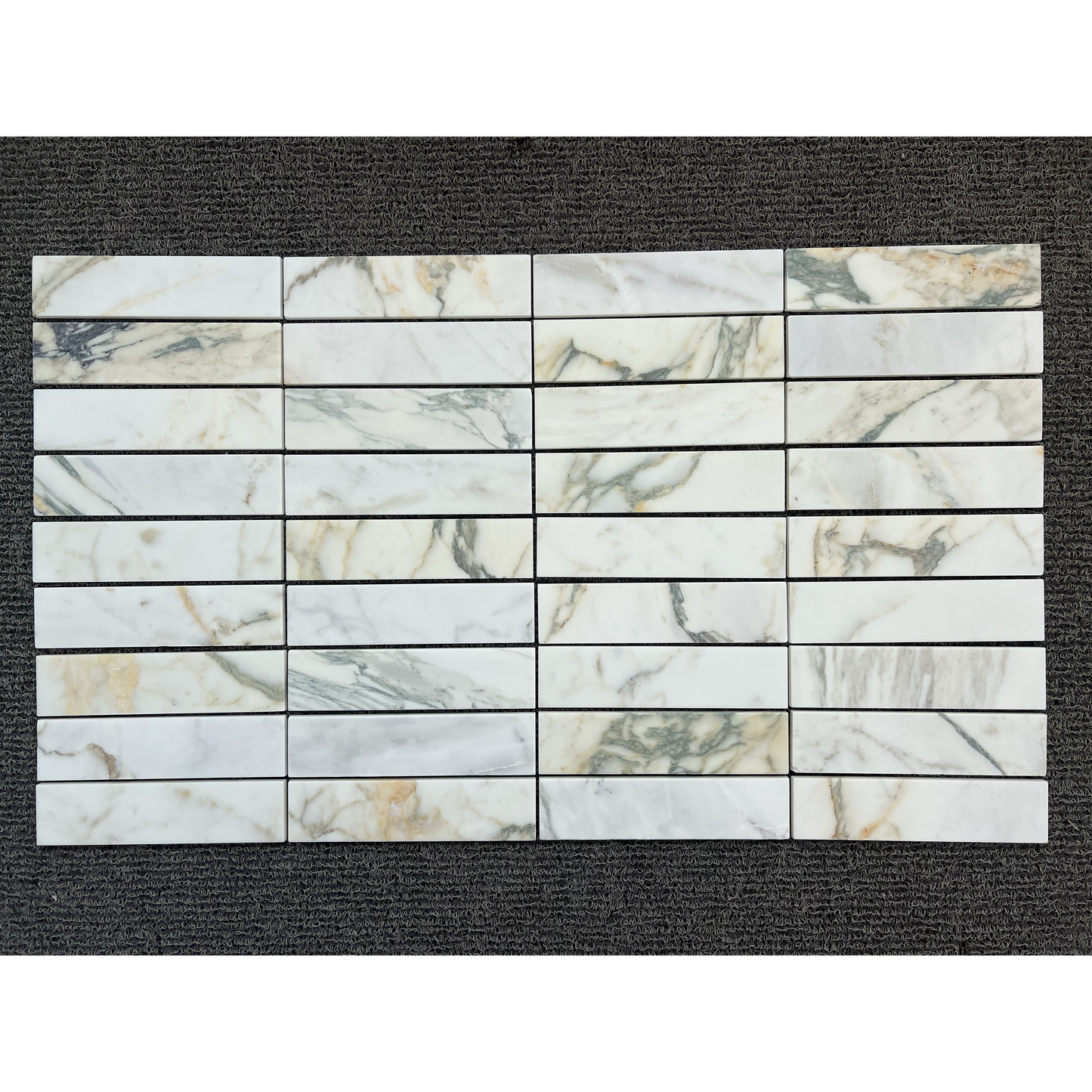 2.25" x 9" CALACATTA MONET BRUSHED & PILLOWED EDGE