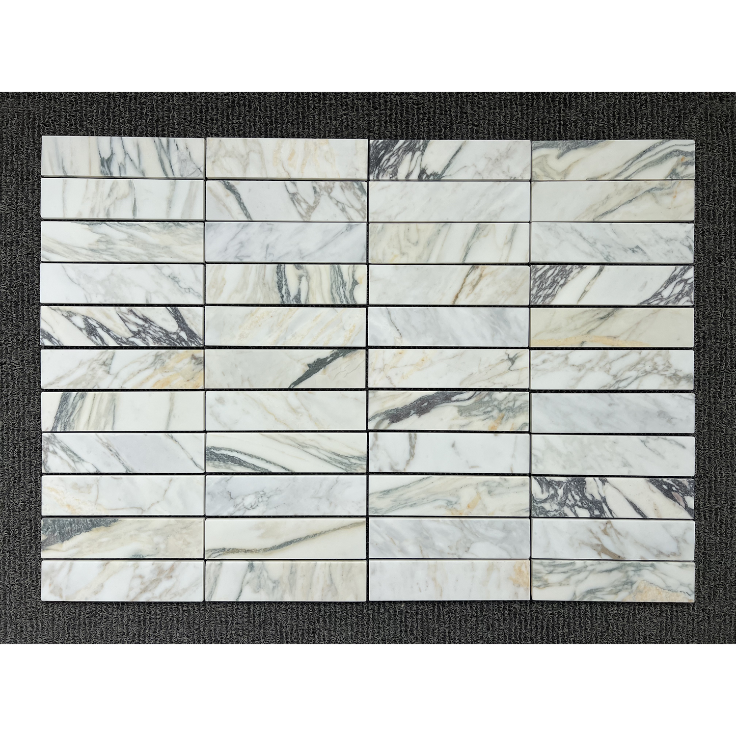2.25" x 9" CALACATTA MONET BRUSHED & PILLOWED EDGE
