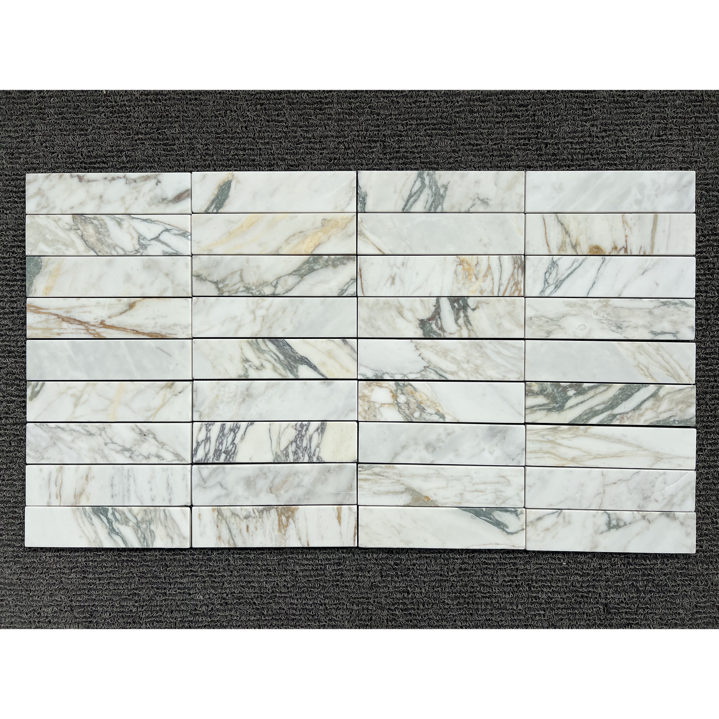 2.25" x 9" CALACATTA MONET BRUSHED & PILLOWED EDGE