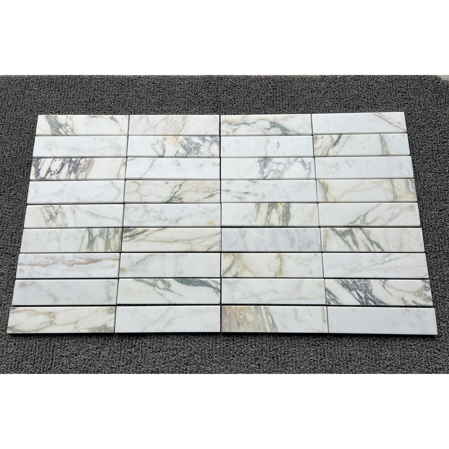 2.25" x 9" CALACATTA MONET BRUSHED & PILLOWED EDGE
