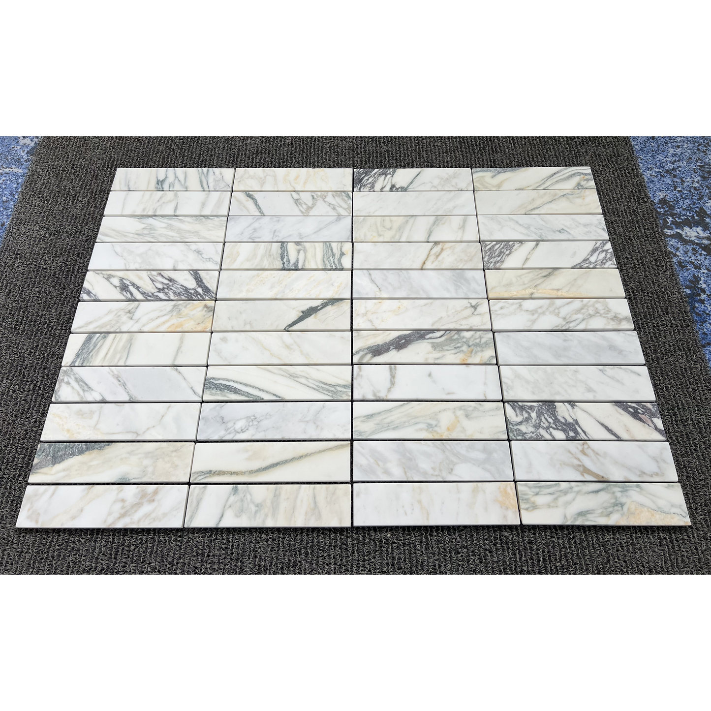 2.25" x 9" CALACATTA MONET BRUSHED & PILLOWED EDGE