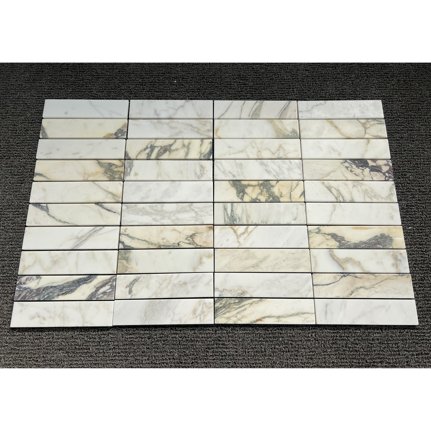 2.25" x 9" CALACATTA MONET BRUSHED & PILLOWED EDGE