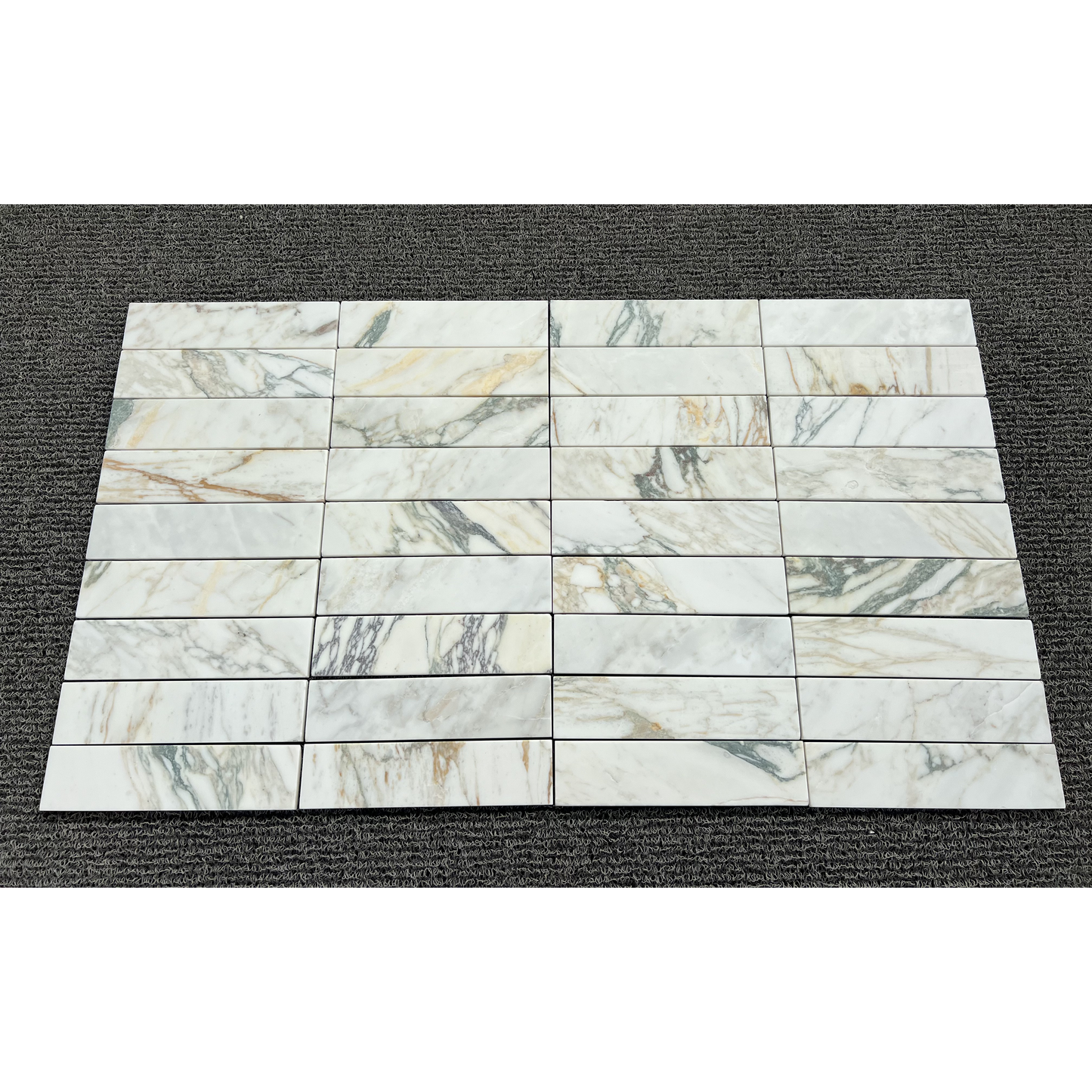 2.25" x 9" CALACATTA MONET BRUSHED & PILLOWED EDGE