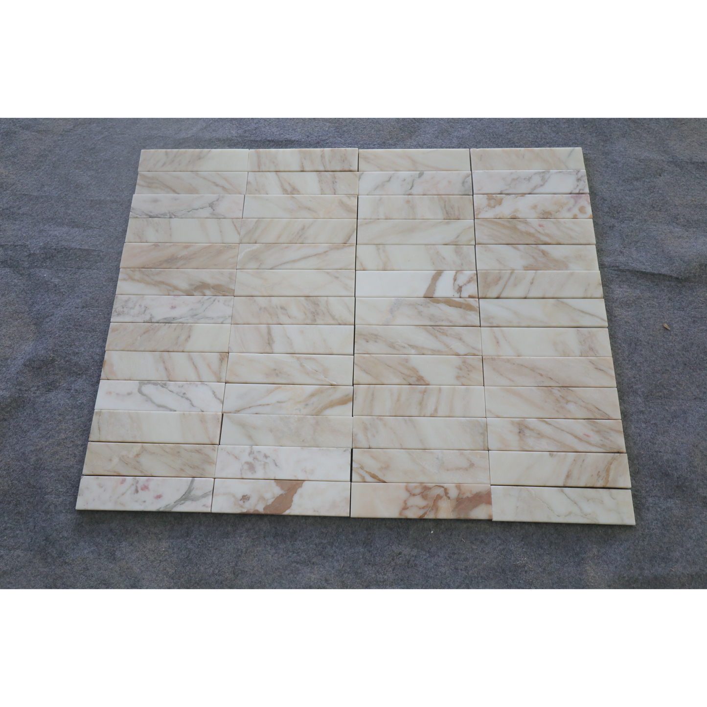 2.25" x 9" CALACATTA VAGLI BRUSHED & PILLOWED EDGE