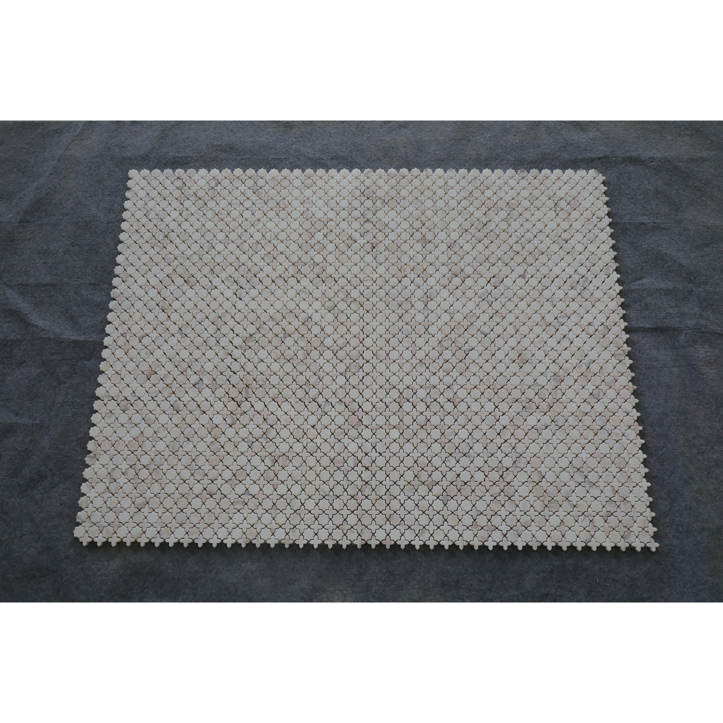 ARABESQUE CROSS CALACATTA VAGLI TUMBLED