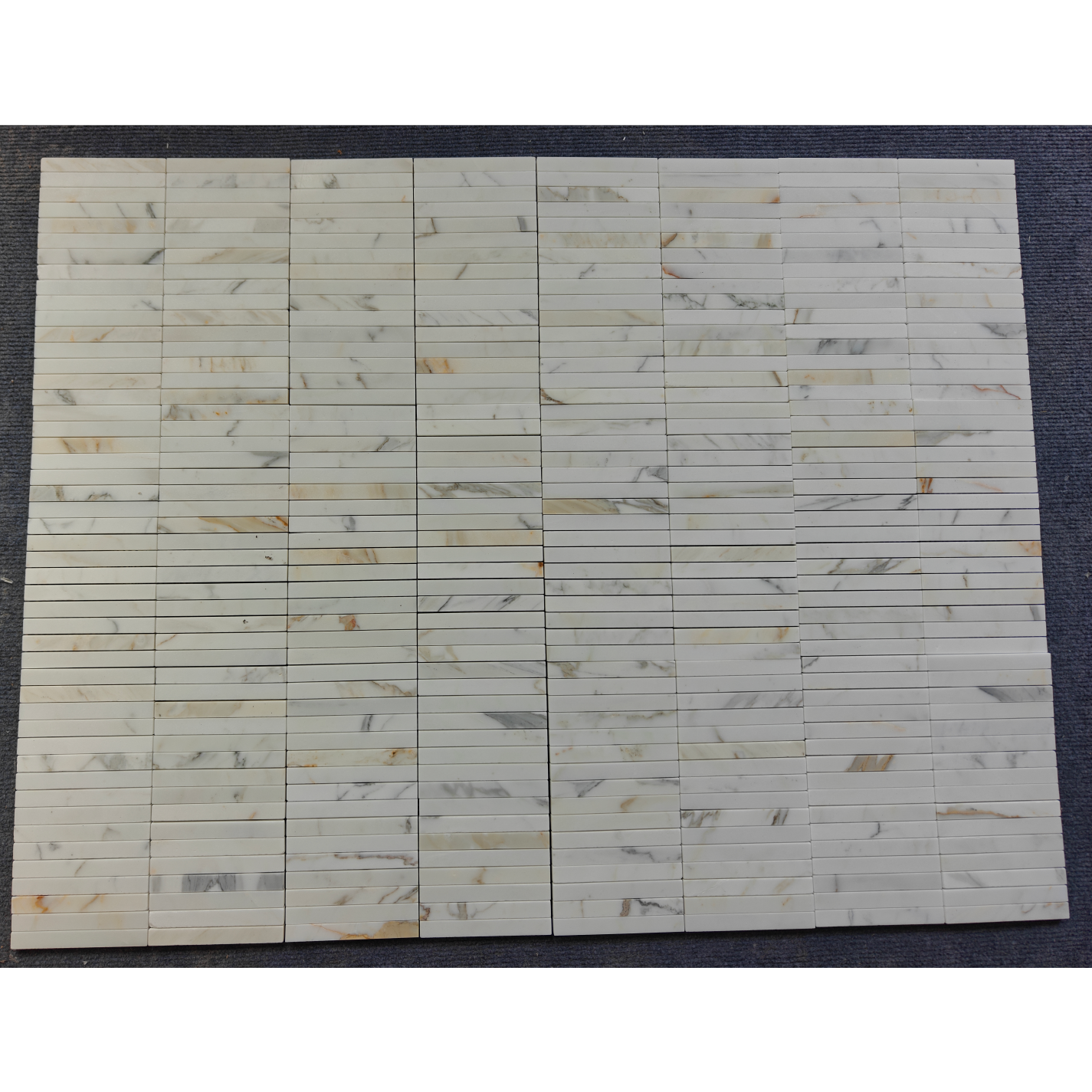GRAND STICKS CALACATTA GOLD HONED
