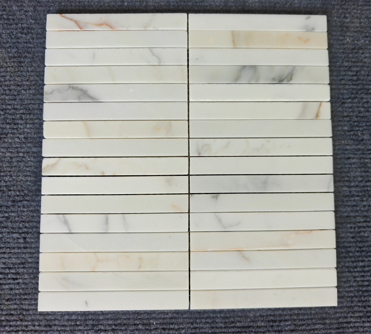 GRAND STICKS CALACATTA GOLD HONED