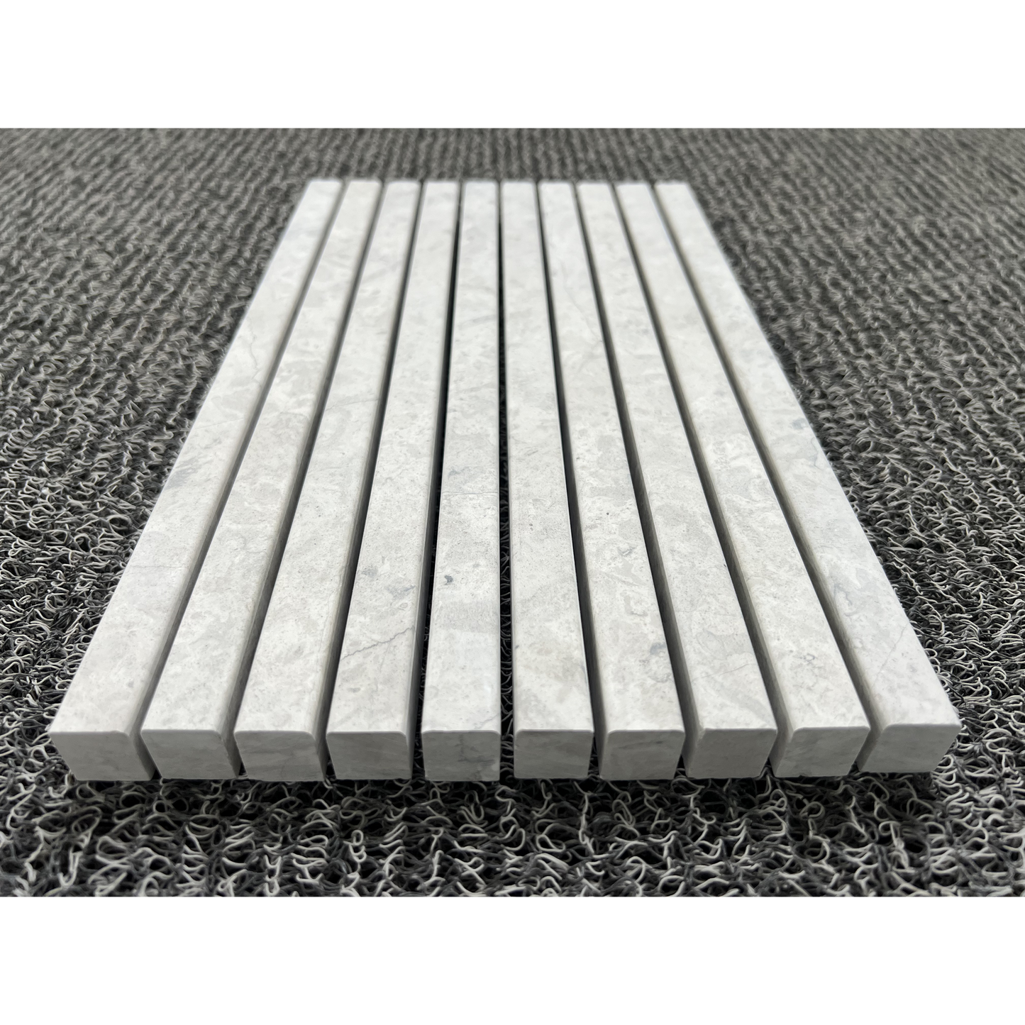 5/8" x 12" MOLDING LINER THELA GREY HONED